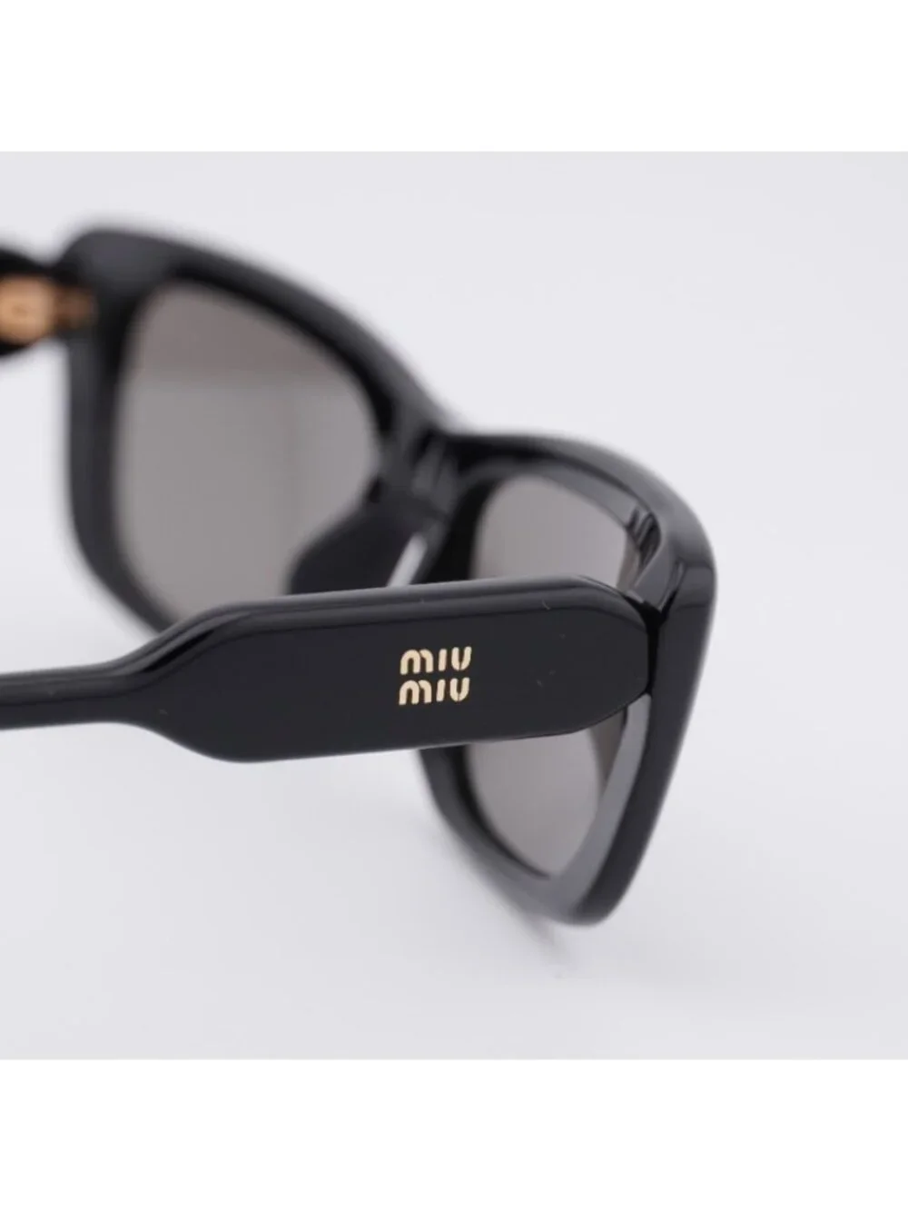 Miu Miu MU B12S 16K80Q Sunglasses Glossy Black Rectangle Frame, Dark Grey Lenses
